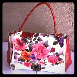 Badgley Mischka top handle handbag.